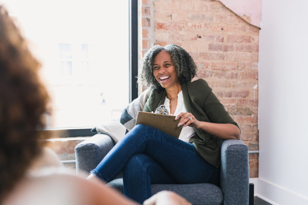 Counselor speaks with a client